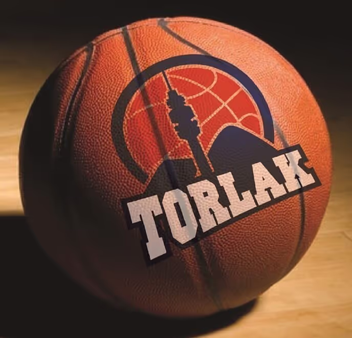 Basketball with a logo showing a mountain, a tower silhouette, and the word TORLAK.